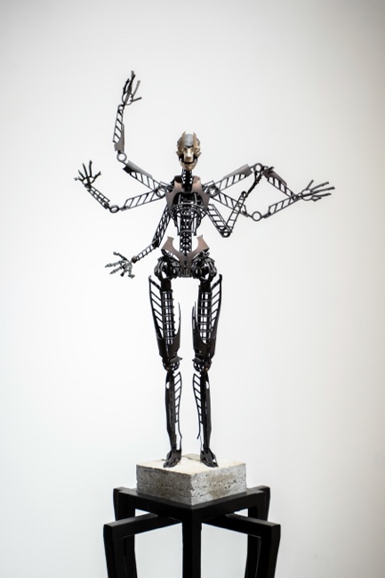 copper sculpture - skeletonn with six arms